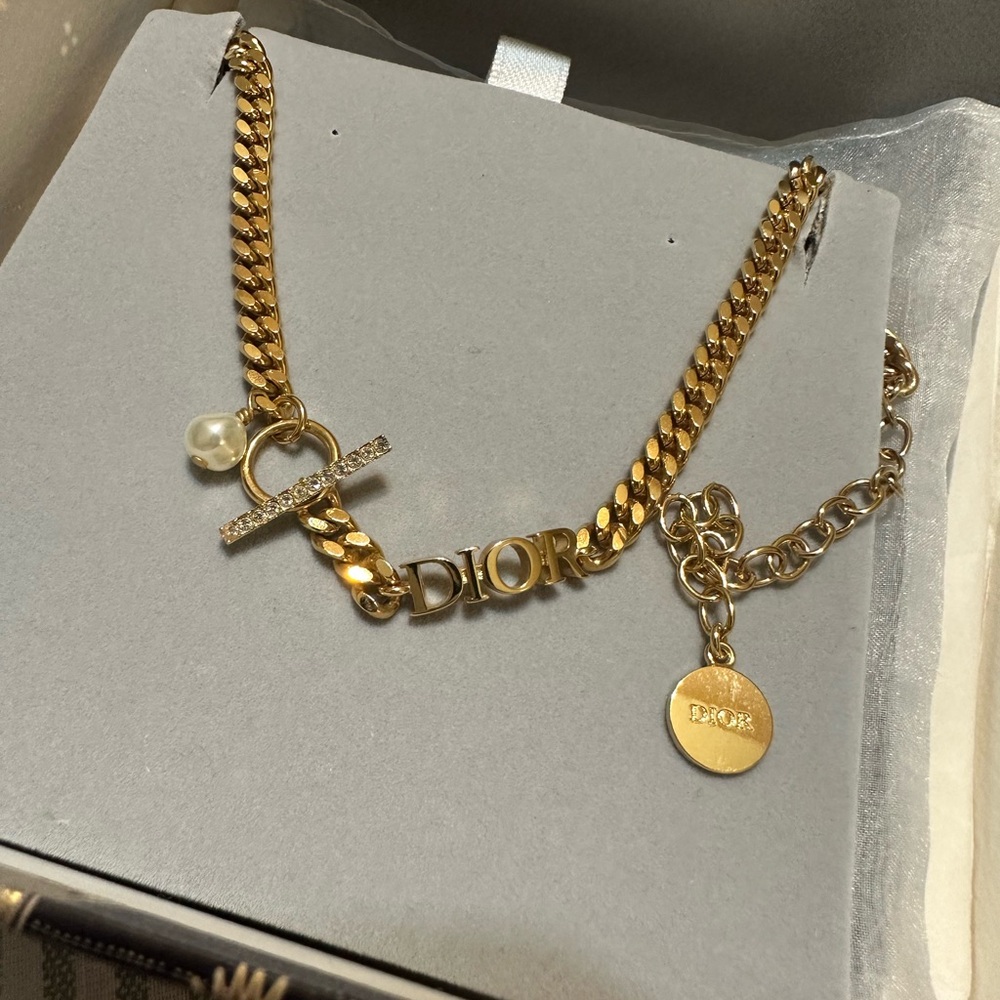 Authentic Dior Gold and White Cuban Link Necklace with Intricate Charms